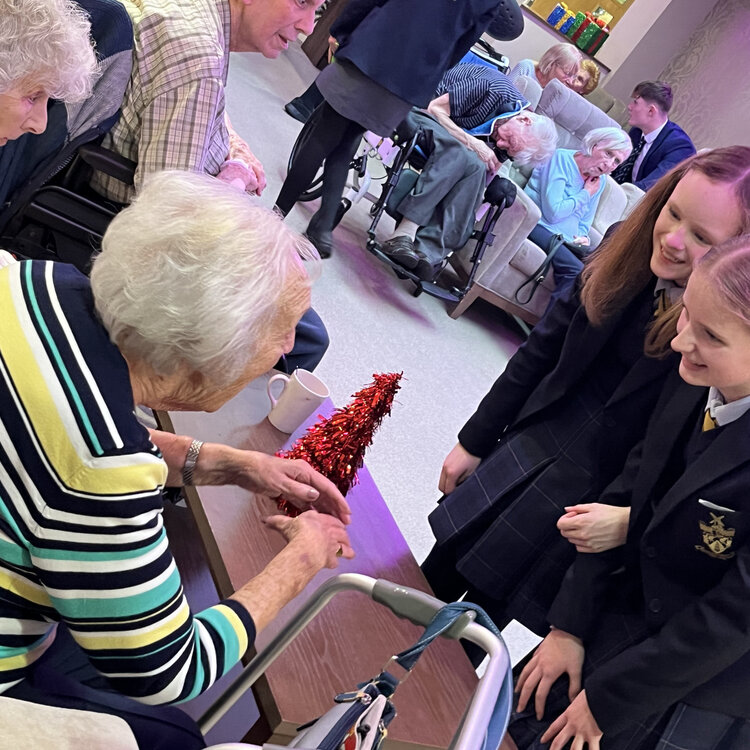 Image of  'Singing for Pleasure' pupils enjoy a delightful afternoon spreading festive cheer at The Moorings and Links View