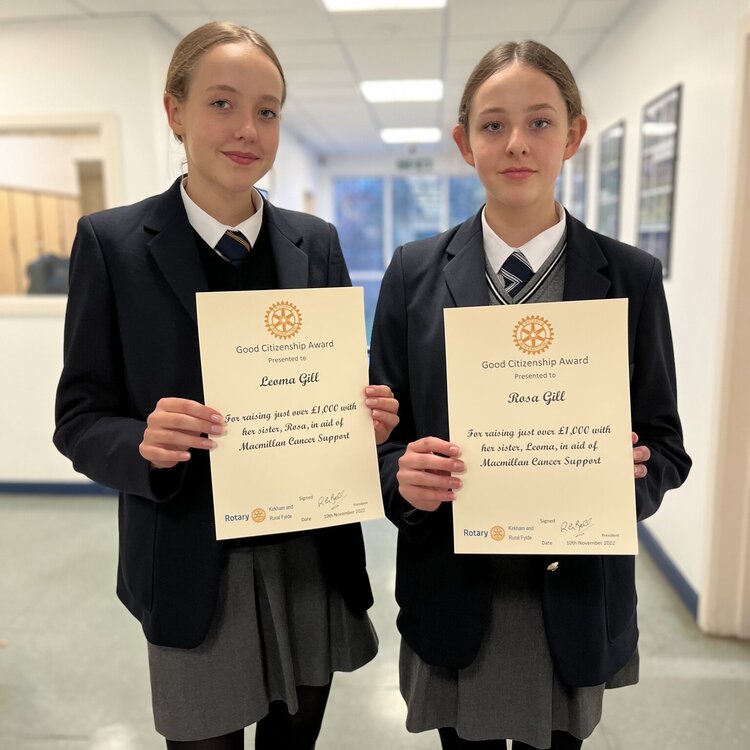 Image of KGS siblings, Leoma and Rosa, presented with their Rotary Good Citizenship Awards