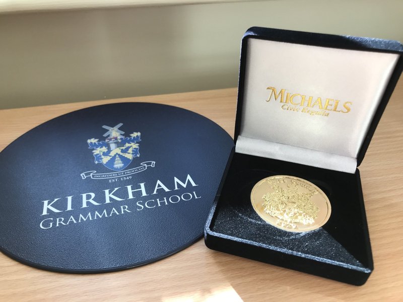 Image of Commemorative Coin Awarded to KGS' Hardworking DofE students